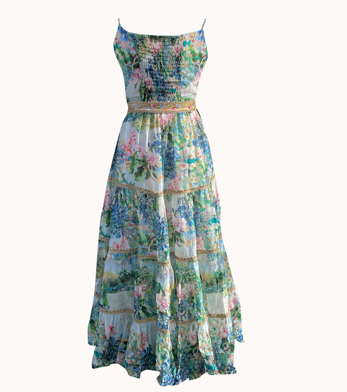 Váy maxi hai dây và đầm đi du lịch nghỉ dưỡng hoa diên vĩ màu xanh mát, chất vải Georgette Rayon thiết kế đính kim sa và bo chun phía sau lưng ôm dáng thoải mái
